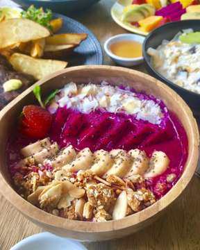You must try our smoothie bowls 🍓
It’s colorful, healthy and fresh ☀️ And of course a really nice pic for instagram! 📸
@gourmetcafedewisri 
#gourmetcafedewisri #smoothiebowls #healthyfood #bali